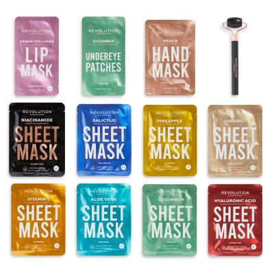 Revolution Skincare 12 Days Of Masking Sheet Mask Advent Calendar Geschenkset Tuchmaske 8 St. + Lippenmaske 1 St. + Handmaske 1 St. + Augenpolster 1 St. + Massageroller für das Gesicht